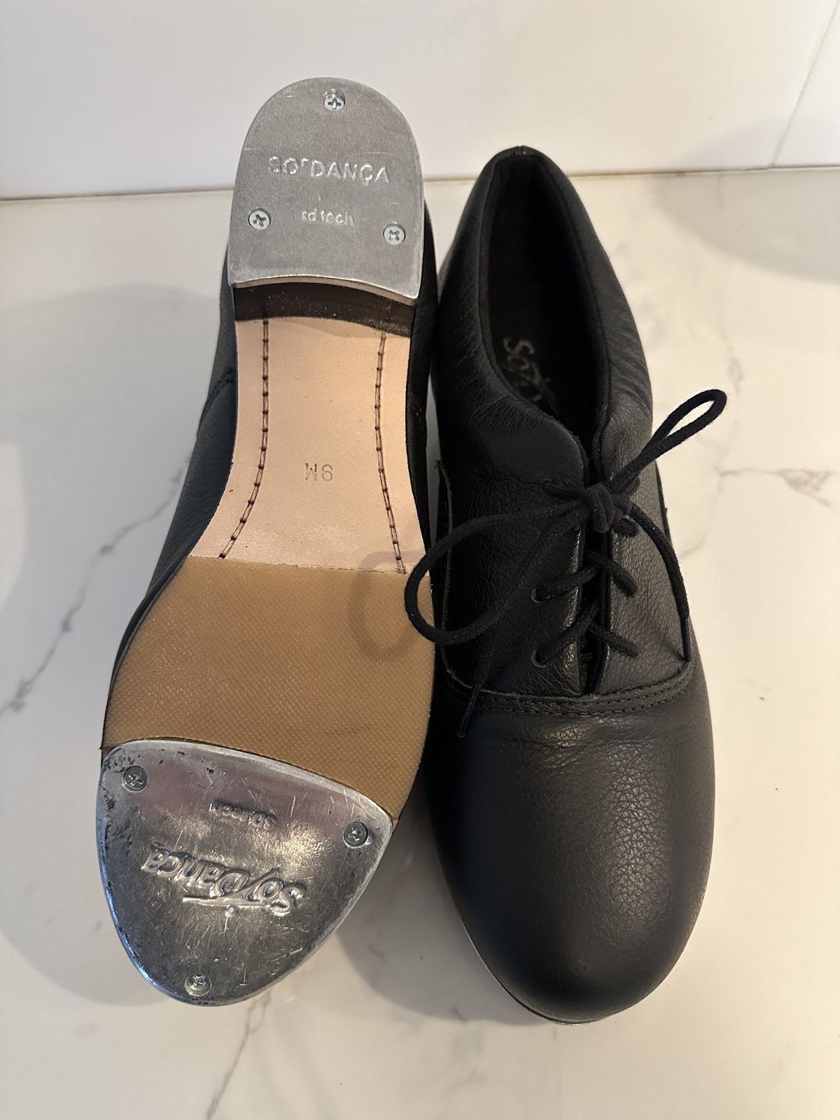 Dress shoes and soles